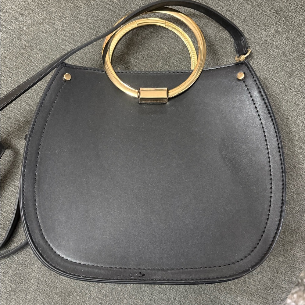 Elegant Black Handbag with Gold Accents